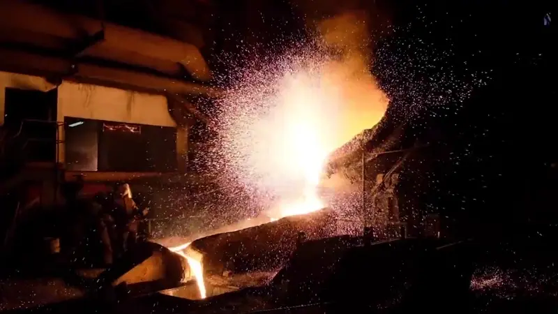 Molten metal pouring from the G.A. Rittenhouse furnace