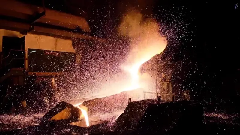 Molten metal pouring from the G.A. Rittenhouse furnace
